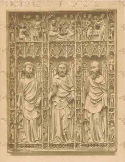 Panel. probably of a casket, page, photomechanical print, inscription: 'Fourteenth Century', number: 'No. 213-65.', London, c. 1867 - in or before 1872, paper, Woodburytype, height 148 mm x width 112 mm, (single) apostle, unspecified, Christ, sculpture (relief, sculpture), A carved stone panel framed by a rectangular border shows three tall standing figures in long draped robes with bearded faces and haloed heads occupying central vertical niches, each figure holding different hand gestures or objects; ornate tracery and small sculpted figures fill the vertical spaces between and beside the main figures, while a horizontal band above contains a series of smaller relief scenes depicting seated and standing figures interacting within architectural niches; the entire surface has a uniform aged stone tone and fine carved details in the garments, hair, and decorative Gothic-style arches and patterns.