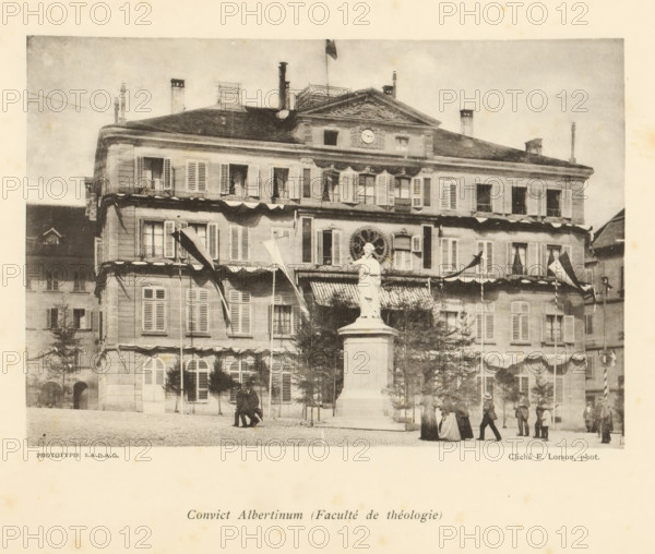 Convict Albertinum (Faculté de théologie), View of the Albertinum on the Square des Places in Fribourg, page, photomechanical print, photographer: Ernest Lorson, Fribourg, maker: SADAG, 1897, paper, collotype, light pressure, height 111 mm x width 162 mm, square, circus, university, A wide façade of a multi-story stone building with many shuttered windows and decorative molding spans the image, a flag flying atop its roof and several chimneys and rooftop structures visible; a statue of a robed figure stands on a tall pedestal in front of the building, surrounded by flagpoles with banners and awnings over ground-floor windows; cobblestone pavement fills the foreground where groups of people in period clothing are walking and standing, and small trees and architectural details frame the scene.