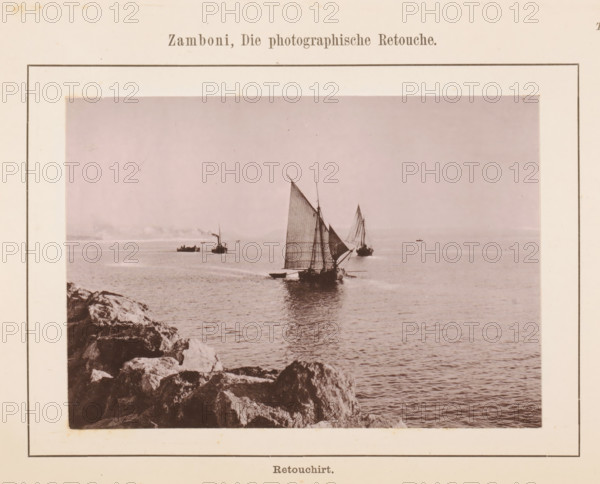 View of a boat along a coast, page, photomechanical print, number: 'Tafel IX.', inscription: 'Retouchirt.', c. 1878 - in or before 1888, paper, collotype, photoprint, height 118 mm x width 181 mm, ships (in general), sea, A sepia-toned photograph mounted on a bordered page shows a rocky shoreline in the foreground and a calm sea extending to the horizon, with several sailboats and a steamboat visible on the water, sails raised and reflections on the surface, distant small vessels near the horizon, and the photograph surrounded by a wide light-colored margin.