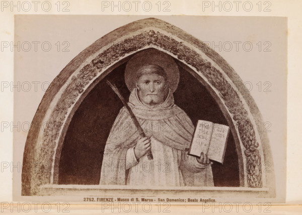 Firenze - Museo di S. Marco - San Domenico, Beato Angelico, Photo reproduction of a fresco depicting Saint Dominic, photograph, reproduction, page, number: '2752.', Florence, after painting by Fra Angelico, San Marco, c. 1880 - in or before 1890, photographer, Tuscany, paper, albumen print, height 99 mm x width 144 mm, Dominic(us) Guzman of Calerueja, founder of the Order of Preachers (or Dominican (Black) Friars, possible attributes: book, dog with flaming torch, lily, loaf of bread, rosary, star, A grayscale image of a robed figure framed within a pointed arch, the figure wearing a circular halo and a hooded cloak, holding a long thin staff in one hand and an open book in the other, with visible folds in the robes and a calm facial expression, the arch surrounding the figure showing textured decorative patterns along its inner edge and a darker recessed background behind the figure, and a plain lighter border outside the arch.