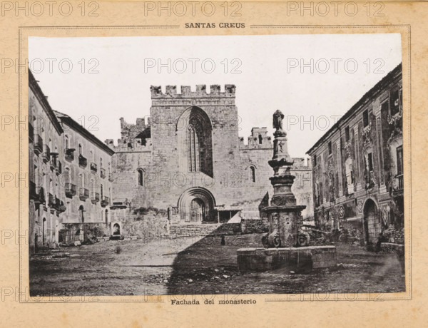 Facade of the Monastery of Santes Creus in Aiguamúrcia, Fachada del monasterio, Santas Creus, page, photomechanical print, Aiguamúrcia, c. 1874 - in or before 1884, Catalonia, paper, collotype, photoprint, height 111 mm x width 161 mm, abbey, monastery, convent, Roman Catholic church, Monastery of Santes Creus, A black and white photograph shows a stone plaza framed by buildings on both sides and a large medieval church or monastery facade in the center with a tall arched window and a rounded main doorway set into thick stone walls topped with crenellations; in front of the building a multi-tiered ornamental fountain with sculpted details stands on a circular basin, and steps lead up to the entrance; flanking the plaza are multi-story buildings with rows of windows and balconies on the left and a decorated facade with ornate window surrounds on the right; the ground appears uneven and worn, and the image is bordered by a textured paper frame.