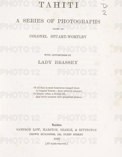 Tahiti. A Series of Photographs taken by Colonel Stuart-Wortley, book, inscription: 'To William smith With best wishes from the author Lady Brassey July 1883.', name: 'Bound by Burn & Co', photographer: Henry Stuart-Wortley, writer (clerical worker): Anna Brassey, publisher: Sampson Low, Marston, Searle, & Rivington, London, 1882, writer (clerical worker), paper, collotype, color on cut, decorated paper, height 219 mm x width 168 mm x thickness 20 mm, The image shows a slightly aged, off-white page with small brownish spots and smudges, featuring centered lines of printed text in various serif fonts and sizes; there is a vertical column of handwritten pencil marks near the top right edge, faint decorative marks along the page, and a block of smaller printed lines near the middle-lower area, with wider blank space toward the lower half.