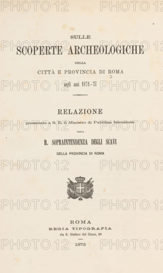 Sulle scoperte archeologiche della città e provincia di Roma negli anni 1871-72, book, inscription: 'British School of Rome duplicate', 1873, pasteboard, paper, printing, albumen print, height 272 mm x width 185 mm x thickness 15 mm, A cream-colored aged paper page with darker age spots and small stains scattered across the surface, featuring a centered ornamental emblem with a crowned shield and decorative flourishes, and multiple lines of printed serif text arranged above and below the emblem, all aligned down the vertical center of the page.