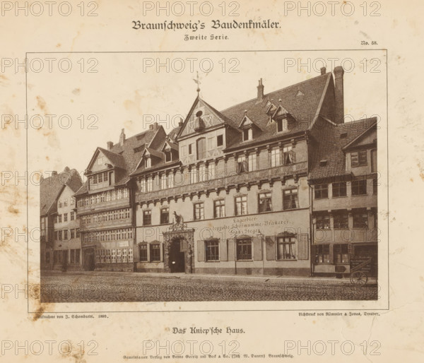 Das Kniep'sche Haus, Exterior of a brewery in Braunschweig, Braunschweig's Baudenkmäler, page, photomechanical print, number: 'No. 58.', photographer: J. Schombardt, Braunschweig, cliché maker: Römmler & Jonas, Dresden, publisher: Benno und Wilhelm Danert Goeritz, 1893, Lower Saxony, Saxony, paper, collotype, photoprint, height 113 mm x width 155 mm, city-view in general, 'veduta', facade (of house or building), A sepia-toned print showing a row of ornate, historic buildings with steep gabled roofs, dormer windows, decorative timber framing, and a large carved entranceway; the street in front is paved with cobblestones and a small cart wheel is visible at the right edge; stains and foxing appear on the paper around the framed image and the paper shows a thin printed border.