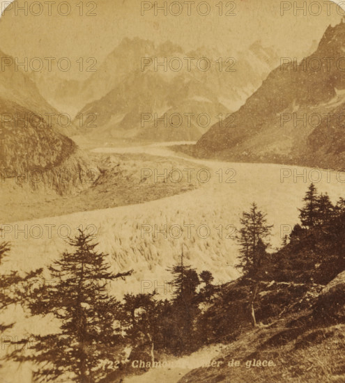 View of the Mer de Glace near Mont Blanc in Chamonix, Chamounix. Mer de glace., Views and landscapes in Europe, Africa and Asia, Geographical Sculpture Gallery, collected by MJ Broekhuijsen, Head of a school in Amsterdam, stereograph, Bottom left of photo numbered: 722., annotation: 'MER DE GLACE (ICE sea) one of the largest glaciers in the Alpine region, 9 km long and here and there more than 1 km wide., The village of CHAMOUNIX at the foot of MONT-BLANC in the valley of the ARVE (tributary of the RHONE) is not visible in the picture. This one was taken east of Chamonix, on the road along the lower part of the glacier at +, - 1500 m above sea level.', annotation: 'France-Switzerland Border', Chamonix, publisher: Merkelbach & Co., Amsterdam, compiler (person in literature): Martien Johan Broekhuijsen, c. 1905, photographer, compiler (person in literature), pasteboard, paper, albumen print, height 89 mm x width 178 mm, Part of a group of 52 stereophotos used in primary education as a su...