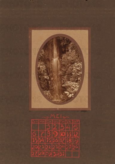 Traveler at a waterfall, album page, photograph, This photo is part of an album., annotation: 'MEI, ', Indonesia, 1880 - in or before 1923, photographer, pasteboard, paper, daylight collodion silver print, height 98 mm x width 65 mm, travelling, tourism, waterfall (landscape with figures, staffage), A vertical image with a central rectangular frame containing an oval photograph of a narrow waterfall cascading down a rocky, vegetated cliff, surrounded by dense foliage and leafy plants, and a small figure standing near the base of the waterfall; the frame is set against a dark, textured background and below the framed photograph there is a grid of hand-drawn squares filled with hand-drawn marks in a vivid color.