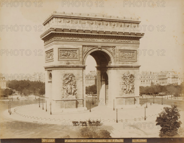 PARIS Arc de Triomphe de l'Étoile, Arc de Triomphe in Paris, photograph, Part of Travel album with recordings of sights in Sweden, Norway, Denmark, Bavaria, Milan and Paris., number: 'No. 127', photographer: LP, Paris, c. 1870 - c. 1890, LP, photographer, paper, albumen print, albumendruk, height 225 mm x width 282 mm, triumphal arch, Arc de Triomphe, A large stone triumphal arch occupies the center of the image, showing a broad central archway flanked by sculpted relief panels and high bas-relief groups on the facing pillars, with ornate cornices and decorative roundels along the upper entablature; the arch stands on a paved plaza edged by short posts linked with chains and punctuated by tall lampposts, with a horse-drawn carriage and two horses visible near the foreground; rows of trees and multi-story buildings line the background on either side, and the sky appears pale and empty above the monument.