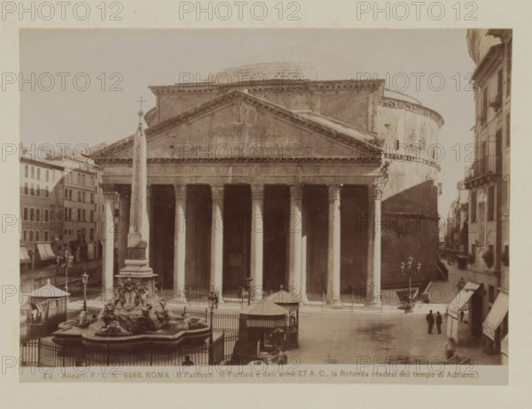 View of the Pantheon and the Macuteo obelisk in Rome, Italy, Il Pantheon. Il Portico e dell' anno 27 AC, la Rotonda credesi del tempo di Adriano, Roma, photograph, number: 'Pe. Ia. No. 6688.', photographer: Fratelli Alinari, Rome, after sculpture by anonymous, 1852 - 1900, Fratelli Alinari, photographer, after sculpture by, pasteboard, paper, albumen print, height 101 mm x width 141 mm, height 167 mm x width 223 mm, church (exterior), obelisk, needle, Pantheon, A sepia-toned photograph of a classical temple façade with a triangular pediment and a row of tall fluted columns supporting an entablature, flanked by a curved rotunda wall on the right and adjacent buildings on the left, with an obelisk standing in front of the temple and a sculpted fountain basin with ornate figures at its base, street lamps and a fenced area around the fountain, awnings and shopfronts along the surrounding streets, and two figures standing on the paved street near the lower right corner.