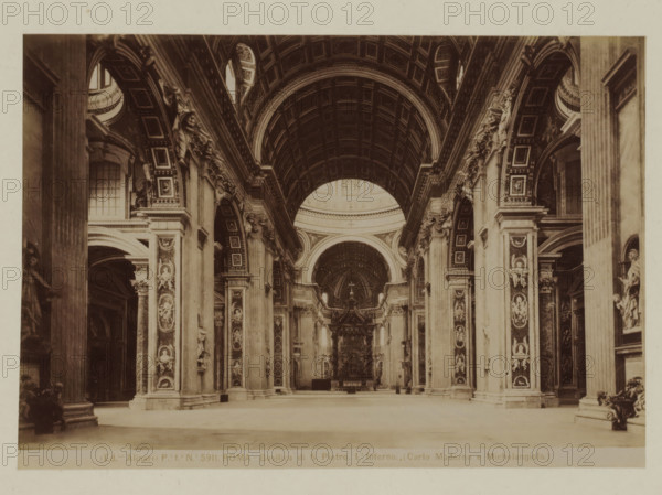 Basilica di S. Pietro. L'Interno (Carlo Maderna e Michelangiolo), Interior of St. Peter's Basilica in Rome, Italy, Roma, photograph, number: 'Po. Io. No. 5911.', photographer: Fratelli Alinari, Vatican City, 1852 - 1900, pasteboard, paper, albumen print, height 100 mm x width 142 mm, height 168 mm x width 212 mm, interior of church, St. Peter's Basilica, A wide interior view of a grand ornate nave with a high coffered barrel vault and a large arched dome visible toward the rear, flanked by tall paired columns and pilasters decorated with relief panels and sculpted figures; elaborate archways and richly detailed cornices run along both sides, with niches holding statues and decorative moldings; the floor is open and spacious leading toward a raised altar area under a decorated arch, and the overall palette is sepia-toned with strong contrasts between shadowed recesses and illuminated architectural surfaces.