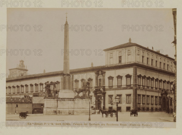 View of the Palazzo Quirinale in Rome, with obelisk in the foreground, Italy, Palazzo del Quirinale ora Residenza Reale (F. Ponzio), Roma, photograph, number: 'Pe. Ia. No. 6419.', photographer: Fratelli Alinari, Rome, 1852 - 1900, pasteboard, paper, albumen print, albumendruk, height 98 mm x width 140 mm, height 168 mm x width 224 mm, square, circus, obelisk, needle, hôtel, ie small palace in city, Palazzo del Quirinale, A sepia-toned photograph shows a large classical building with rows of tall windows and decorative window frames, a corner tower section with a tiled roof and a simpler ground level facade, and an adjoining long facade topped by a clock tower visible at the left edge. In front of the building stands a tall obelisk with a cross at its top mounted on a multi-tiered stone base, and statues of horses and human figures positioned around the base. On the street in front of the building are ornate lamp posts and horse-drawn carriages with visible horses, and a few small struc...