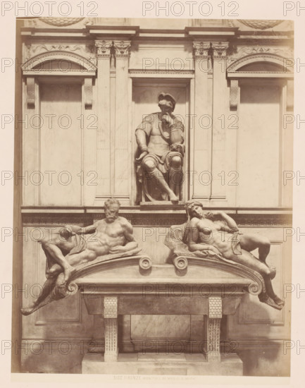 Tomb monument for Lorenzo de' Medici in the Medici Chapel in Florence, Italy, Mont. di L. De Medici di Mich., Firenze, photograph, address: 'GIACOMO BROGI, FOTOGRAFO-EDITORE, FIRENZE, LUNG ARNO DELLE GRAZIE 15', number: '3102.', photographer: Giacomo Brogi, Florence, publisher: Edizioni Brogi, after sculpture by Michelangelo, 1864 - 1881, Giacomo Brogi, Edizioni Brogi, Michelangelo, photographer, publisher, after sculpture by, Tuscany, pasteboard, paper, albumen print, albumendruk, height 470 mm x width 350 mm, Person, Lorenzo de' Medici, piece of sculpture, reproduction of a piece of sculpture, grave-building, monumental tomb, Cappelle Medicee, A stone architectural facade with a central recessed niche containing a seated male figure wearing a draped garment and a head covering, one hand resting on his chin and the other on his knee, flanked by vertical pilasters and decorative molding; below, a horizontal entablature supports two reclining nude figures on curved ledges, one male on t...
