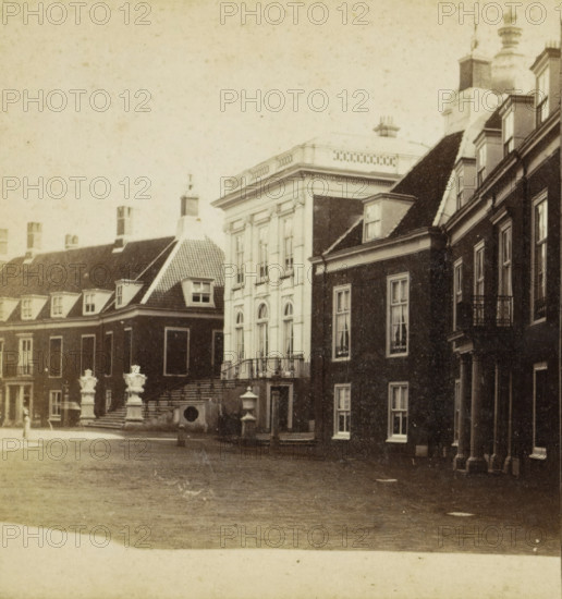 The Hague, Huis ten Bosch, View of Huis ten Bosch Palace in The Hague, stereograph, 1868 - 1890, photographer, pasteboard, paper, albumen print, albumendruk, height 85 mm x width 169 mm, palace, Paleis Huis ten Bosch, A sepia-toned street scene showing the facades of several connected buildings with tall windows and varied rooflines, including pitched and flat roofs with dormer windows and chimneys, a central lighter-colored building with ornate window frames and a balustraded roofline, stone steps leading up to an entrance flanked by decorative stone urns, iron railings along balconies and stairways, a paved open area in the foreground, and architectural details such as columns, cornices, and window sills visible across the structures.