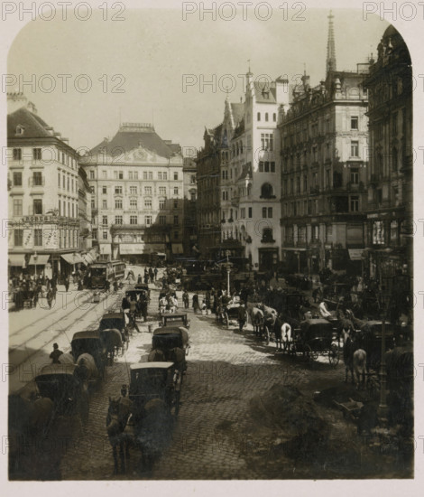 Neuer Markt in Vienna, seen towards the north, Neuer Markt, Wien, stereograph, number: '4549', number: 'No. 4549', Vienna, publisher: Würthle & Sohn, Salzburg (city) (possibly), 1908 - 1909, photographer, Lower Austria, paper, baryta paper, gelatin silver print, developing gelatin silver print, height 90 mm x width 177 mm, square, circus, Hoher Markt, A wide street scene filled with horse-drawn carriages and pedestrians between tall ornate buildings, cobblestone pavement visible under the vehicles, a tram with tracks and people waiting, multi-story facades with decorative architectural details and windows, a taller lighter-colored corner building with arched openings, crowds of people clustered along sidewalks and crossing the street, numerous horses hitched to carriages lining both sides of the road, lampposts and street furniture, and a distant building with a pitched roof and ornamental rooftop features.