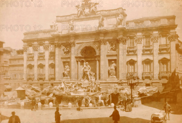 Roma, Fontana di Trevi, Trevi Fountain in Rome, photograph, page, number: '1014 ?', Rome, c. 1883 - in or before 1888, photographer, paper, albumen print, height 100 mm x width 140 mm, Photo on page 120., ornamental fountain, Trevi Fountain, A faded photograph of a grand stone building with ornate columns and sculpted figures on its façade, a large arched central window above a prominent sculpted fountain with flowing water and multiple statues, rocky basins at the fountain's base, several silhouetted people and a person pulling a small cart in the foreground, surrounding buildings partially visible at the sides, and an overall warm, sepia-toned appearance.