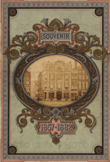 Corner building in Amsterdam, presumably belonging to Hendrik Willem Nijman and Catharina Maria Beijer, photograph, Amsterdam, c. 1877 - in or before 1882, photographer, paper, albumen print, height 74 mm x width 94 mm, Photo on front cover., façade (of house or building), An ornate rectangular design with a muted green background and layered decorative borders in pink, gray, and black surrounds an oval frame featuring a sepia-toned photograph of a multi-story classical building with arched windows and storefronts at street level; the oval frame is embellished with scrolling acanthus leaves, floral motifs, and ribbon-like patterns in gold, brown, and gray, with additional stylized floral and scroll decorations above and below the frame.