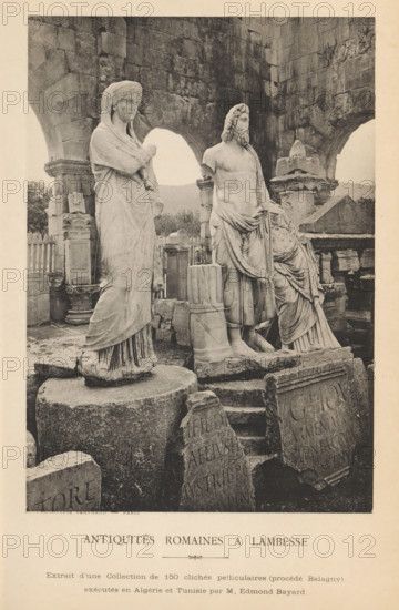 Antiquités romaines à Lambesse, Roman antiquities at Lambaesis, page, photomechanical print, inscription: 'Phototypie Berthaud - Paris, Extrait d'une Collection de 150 clichés pelliculaires (process Balagny), exécutes en Algérie et Tunisie par M, Edmond Bayard', photographer: Edmond Bayard, Lambaesis, cliché maker: Michel Berthaud, Paris, c. 1881 - in or before 1886, Edmond Bayard, Michel Berthaud, photographer, cliché maker, North Africa, paper, collotype, photoprint, height 165 mm x width 116 mm, piece of sculpture, reproduction of a piece of sculpture, statues, paintings, etc., objects of worship in Roman religion, inscription, The image shows a group of weathered stone statues and architectural fragments arranged among ancient ruins. In the foreground, a draped female figure stands on a round pedestal with folded arms and a covered head, her garments falling in vertical folds to her feet. Beside her, a bearded male figure with a partially draped torso stands on a separate base, his...