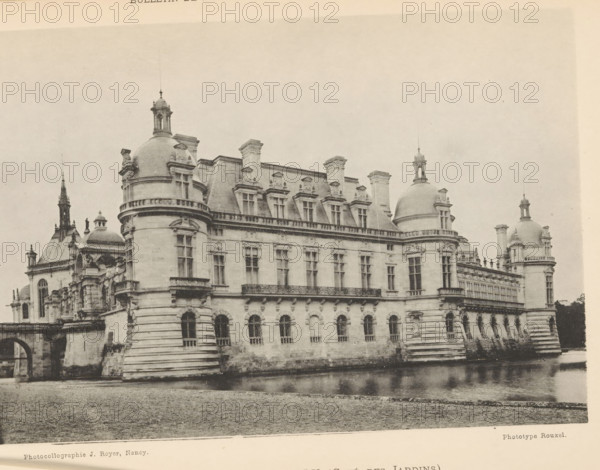 Chateau de Chantilly (Coté du Champ de Courses), View of Château de Chantilly, page, photomechanical print, inscription: '(Château Moderne) (Château Ancien)', photographer: H. Rouxel, Chantilly, cliché maker: Jules Royer, Nancy, c. 1886 - in or before 1891, printer (person), paper, collotype, photoprint, height 120 mm x width 174 mm, Print on unnumbered page., castle, Château de Chantilly, A large stone building with ornate architectural details sits beside a body of water, featuring rounded corner towers topped with domes and small lantern structures, a row of rectangular windows with decorative frames along an upper level, and arched openings at the lower level; a balustraded balcony runs across part of the facade, chimneys and dormer windows project from the steep roofline, and a distant spire and additional domed structures are visible behind the main block, all rendered in a monochrome, slightly aged photographic tone.