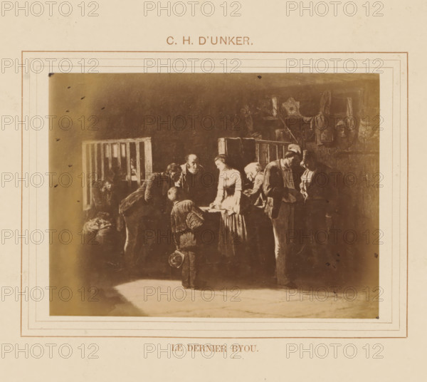 Le dernier byou, Photo reproduction of Le dernier byou by Carl Henrik D'Unker, photograph, reproduction, page, after painting by Carl Henrik D'Unker, c. 1878 - in or before 1883, Carl Henrik D'Unker, photographer, after painting by, paper, albumen print, albumendruk, height 96 mm x width 131 mm, painting, drawing and the graphic arts, A faded sepia image mounted on a cream paper with decorative rectangular borders shows a dim interior scene of several people gathered around a table; a woman in a light dress stands at the center leaning slightly forward, surrounded by men and children in darker clothing who are bending or standing close by, one child holding a hat and facing the table; in the background there are wooden railings and indistinct wall hangings and objects, with shadows and worn textures throughout the image.