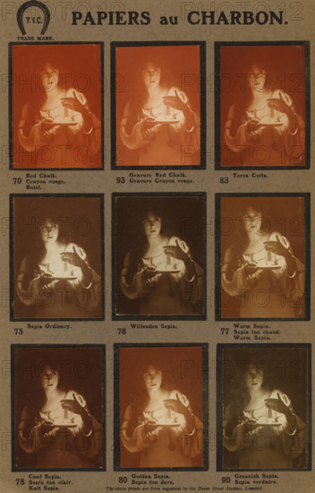 Colour chart of Illingworth's permanent carbon tissues, book, maker: Thomas Illingworth & Co., London, c. 1910, Thomas Illingworth & Co., paper, pasteboard, carbon print, height 248 mm x width 162 mm x thickness 4 mm, A vertical sheet with a grid of rectangular framed photographic panels showing the same portrait of a woman holding a shallow dish and a small object, her gaze directed slightly upward and to the side, wearing a loose, light-colored dress with decorative bands on the sleeves and a long pendant hanging from her waist; each panel has a different overall tint ranging from warm orange and reddish tones to sepia, brown, and greenish hues, and the portraits show variations in contrast and shadow with the woman's face and hands illuminated while the background remains dark; the sheet has a textured, neutral-toned background and thin dark borders around each photographic panel with slight wear and spotting on the surface.