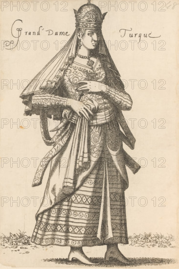 Turkish noblewoman, Grand Dame Turque, print, album cover, book illustration, Print is part of an album., printmaker: Léon Davent, after drawing by Luca Penni (attributed to), after drawing by Nicolas de Nicolay (possibly), publisher: Guillaume Rouille (I), Lyon, 1555 - 1568, Léon Davet, Attributed to, paper, etching, mounted on album page, height 258 mm x width 174 mm, A tall woman stands facing slightly to the side wearing an ornate headdress with pointed details and a long veil that drapes over her shoulders, a decorative necklace and earrings visible at her neck, and a richly patterned gown with layered sleeves, embroidered bodice, and a wrapped sash tied at her waist; her hands are clasped at her midsection, one resting over the other, and the skirt shows repeated geometric and floral bands that reach down to simple pointed shoes standing on a textured ground, with short tufts of grass near the hem.