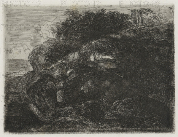Rock formation, print, printmaker: Alexander Schaepkens, 1830 - 1899, paper, chine collé, etching, height 90 mm x width 117 mm, rock-formations, A detailed monochrome etching shows a rocky landscape with densely hatched shading and crosshatching that forms textured boulders and uneven ground, a dark mass of foliage rising near the top center with intricate leaf-like scribbles, a banded sky with horizontal hatch marks and soft cloud shapes at the horizon, and a narrow strip of pale border framing the scene.