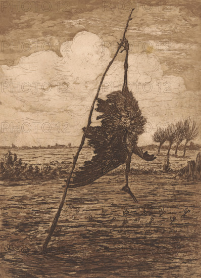 Dead bird as a scarecrow in a meadow, print, printmaker: Jan Willem Nortier (signed by artist), 1874 - 1914, paper, etching, intaglio printmaking technique, etching with plate tone in brown, height 328 mm x width 238 mm, birds (dying animal, death of animal, dead animal), scarecrow, A monochrome etching shows a tall, thin stick leaning diagonally across the image, intersecting a ragged, feathery mass that hangs and drapes from it, with a long narrow form extending downward like a leg and a smaller limb-like shape reaching outward. The background features a textured sky with swirling cloud shapes and horizontal scratch-like marks, and a distant flat landscape with low vegetation and a row of thin, leafless trees. The foreground contains a rough, striated ground surface with short plant shoots and linear grooves, and the overall image has a weathered, sepia-toned appearance with fine crosshatching and etched linework.