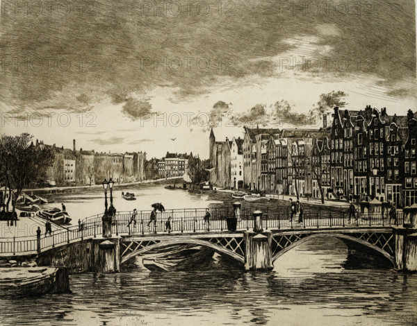View of the Binnen-Amstel in Amsterdam, View of the Binnen-Amstel and the Halvemaansteegbrug (original title), print, View from the windows at the rear of Frederik Muller's auction house., annotation: '1st state', printmaker: Willem Witsen (signed by artist), c. 1906 - c. 1907, Willem Witsen, printmaker, paper, etching, intaglio printmaking technique, height 400 mm x width 498 mm, urban housing, city-view in general, 'veduta', bridge in city across river, canal, Amsterdam, Binnen-Amstel, A monochrome etching of a riverside cityscape showing a bridge in the foreground with decorative railings and lampposts, boats moored beneath and alongside the bridge, and reflected ripples in the water. Along the near edge of the bridge and walkway are several walking figures, some holding umbrellas, and a couple standing close together. Across the canal a row of tall narrow townhouses with varied gabled roofs lines the water, interspersed with leafless trees and small boats at the quayside. In the di...