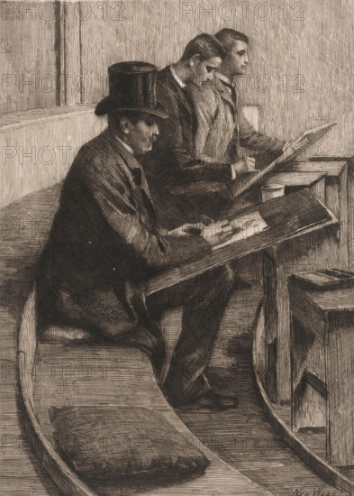 Drawing men, print, printmaker: Nicolaas van der Waay, 1865 - 1936, paper, chine collé, etching, intaglio printmaking technique, drypoint, height 228 mm x width 173 mm, drawing-lesson, Amsterdam, Felix Meritis, A monochrome etching shows three seated men in profile facing right, each at a slanted drawing board; the nearest man wears a tall hat and a dark suit and is hunched over his board with his hands holding drawing tools, the two men behind him wear suits and sit closely together also focused on their boards, one with his head slightly bowed and the other looking straight ahead; the seating consists of curved wooden benches with cushions, and small tables and stools are visible beside the men; the scene is rendered with dense crosshatching and fine linear textures creating shadows and the suggestion of wood grain on the benches, tables, and floor.