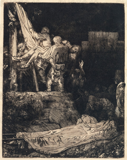 The Descent from the Cross by Torchlight, print, signature and date: 'Rembrandt. f 1654', printmaker: Rembrandt van Rijn, 1654, paper, Japanese paper (handmade paper), etching, drypoint, intaglio printmaking technique, etching and drypoint, printed with light surface tone on Japanese paper, height 205 mm x width 162 mm, descent from the cross: Christ is taken down from the cross, usually by Nicodemus and Joseph of Arimathaea who are standing on the ladders (both arms of Christ detached), A dark, heavily hatched scene shows several clothed figures lifting a draped, limp body toward a wooden upright structure, the drapery cascading and folding around limbs; the lifeless figure's head and torso are partially exposed and the rescuing figures are rendered with visible facial features and garments in varied poses, one face turned upward and another turned away; a raised hand reaches up from a shadowy figure below; rocky, textured ground and heavy fabric fill the lower foreground, and a recta...