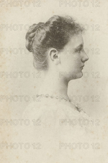 Portrait of Wilhelmina, Queen of the Netherlands, photomechanical print, photographer: Adolphe Zimmermans, cliché maker: anonymous, Netherlands, 1897 - 1899, materials by function, paper, ink, collotype, photoprint and pen in black, height 82 mm x width 56 mm, The title mentioned here refers to the highest title obtained by the sitter, not necessarily to the title that the sitter bears in this performance., Person, Wilhelmina of the Netherlands, A soft-toned profile portrait of a young woman facing right, showing her hair pulled back into a braided bun with short curled bangs at the forehead, a visible ear, a slender neck, and a delicate jawline and nose; she wears a decorative necklace with repeating floral motifs and a light garment at the shoulder, all rendered on a lightly textured, aged paper background.