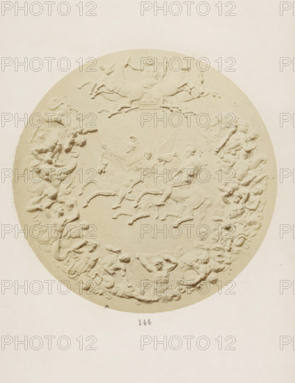 Commemorative medal in memory of the Battle of Waterloo with the Duke of Wellington and Gebhard von Blücher on horseback and surrounding the storming of Olympus by nineteen giants, photograph, page, number: '144', photographer: F. Cole, c. 1857 - in or before 1867, paper, albumen print, height 126 mm x width 126 mm, Photo after page 144., memorial medal, sculpture (relief, sculpture), A circular bas-relief in a pale, uniform color fills the image, showing raised sculpted figures of horses and human figures arranged in a wreath-like composition; at the top a chariot scene with a bearded figure holding implements and horses in motion; lower within the circle several riders on galloping horses and winged figures among them; the circular border is formed by intertwined reclining and seated figures with flowing hair and drapery, some holding objects, creating a continuous ornamental band against a plain background.