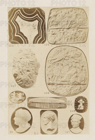 Ten reliefs and portraits in profile, photograph, page, photographer: F. Cole, c. 1857 - in or before 1867, paper, albumen print, height 165 mm x width 101 mm, gem, gemstone, sculpture (relief, sculpture), carving, applied arts, A vertical sheet showing a grid of carved and molded objects photographed in sepia tones, including ornate oval and rounded relief plaques with crowded figurative scenes, a wavy multi-banded abstract pattern, a rough textured oval stone, small circular and oval cameos with profiles and figures, a long rectangular carved slab with parallel grooves, and an oval medallion with a three-dimensional reclining or seated figure, all arranged with small numeric labels beneath each item.