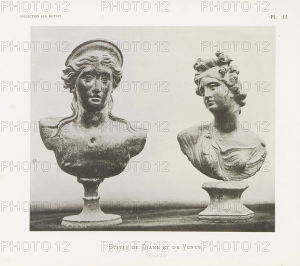 Bustes de Diane et de Vénus, Busts of Diana and Venus, page, photomechanical print, number: 'Pl. 11', photographer: Stephane Geoffray, Paris, 1879, paper, collotype, photoprint, height 158 mm x width 189 mm, piece of sculpture, reproduction of a piece of sculpture, (story of) Venus (Aphrodite), chest, bust - AA - female human figure, (story of) Diana (Artemis), Two weathered sculpted busts on pedestals sit side by side against a plain background, each showing a female head and upper torso. The left bust has wavy hair pulled back with a rounded headband and a solemn facial expression, with a smooth neck and a broad, curved chest that tapers to a textured pedestal. The right bust features curled hair piled atop the head, a slightly turned face with a softer expression, a draped garment visible across the chest, and a flared pedestal base with visible surface roughness.