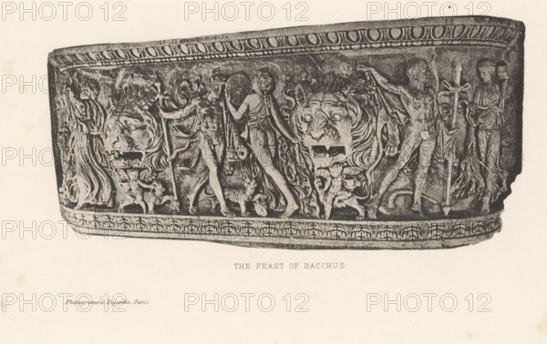 Relief of a sarcophagus, depicting a bacchanal, The feast of Bacchus, page, photomechanical print, cliché maker: Dujardin Frères, Paris, c. 1867 - in or before 1877, photographer, paper, photoaquatint, height 145 mm x width 224 mm, sarcophagus, thiasos, ie Bacchus' revel-rout, bacchanal without Bacchus, decorating 'en relief', appliquéing, A horizontal stone relief with a decorative border along the top and bottom shows a procession of carved human figures and mythic elements in high relief; several draped and partially nude figures face different directions, some holding staffs or curved objects, and one figure appears to be reaching toward another. Two large carved feline heads with open mouths are prominent in the center area, integrated into flowing drapery and vegetal motifs. Smaller childlike figures and animal forms appear near the base, and elaborate folds of cloth and braided hair detail the humans. The overall surface shows textured carving and worn stone tones against a ligh...
