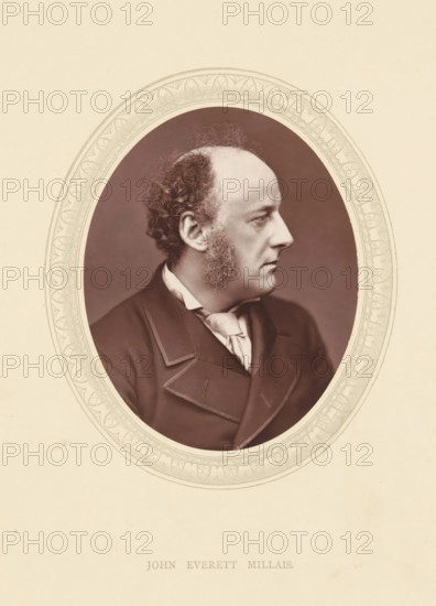 John Everett Millais, page, photomechanical print, photographer: Lock & Whitfield, cliché maker: anonymous, c. 1871 - in or before 1876, paper, Woodburytype, Woodburytypie, height 115 mm x width 89 mm, Person, portrait, self-portrait of painter, historical persons (portraits and scenes from the life) ((full) bust portrait), An oval portrait of a middle-aged man in profile facing right, shown from the shoulders up with a high forehead, receding hairline, curly hair at the back of his head, prominent sideburns, and a clean-shaven chin, wearing a dark formal coat with wide lapels and a light-colored cravat, all set against a dark oval background framed by an ornate light decorative border on a pale textured page.
