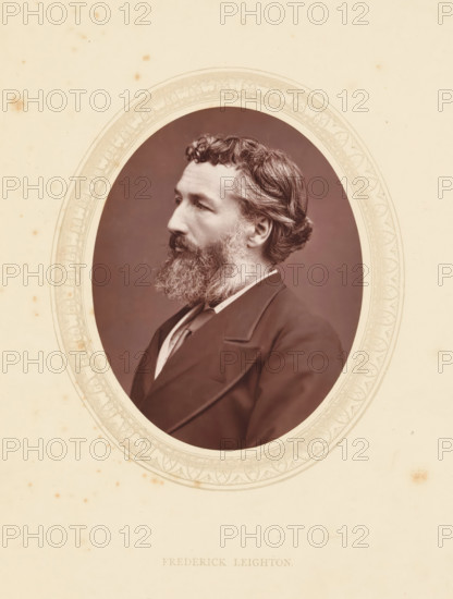 Frederick Leighton, page, photomechanical print, photographer: Lock & Whitfield, cliché maker: anonymous, c. 1871 - in or before 1876, paper, Woodburytype, Woodbury Process, height 115 mm x width 89 mm, Person, portrait, self-portrait of painter, historical persons (portraits and scenes from the life) ((full) bust portrait), A sepia portrait of a bearded man shown in profile inside an ornate oval frame, with wavy hair, a full beard, a dark jacket with wide lapels, and a light shirt collar visible, set against a plain dark background and mounted on aged paper with small spots and an embossed decorative border around the oval.