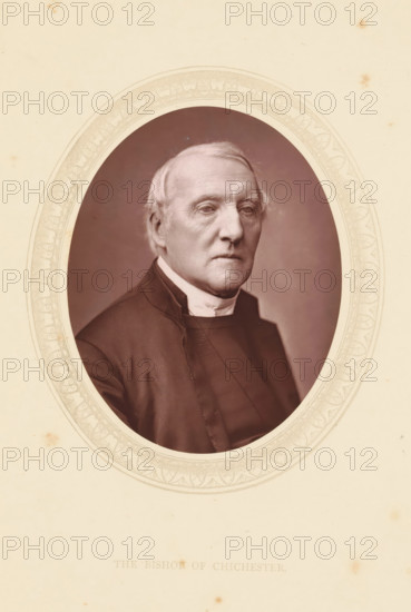 The bishop of Chichester, page, photomechanical print, photographer: Lock & Whitfield, cliché maker: anonymous, c. 1871 - in or before 1876, paper, Woodburytype, Woodbury Process, height 115 mm x width 89 mm, Person, Richard Durnford, archbishop, bishop, etc. (Roman Catholic), historical persons (portraits and scenes from the life) ((full) bust portrait), An oval sepia portrait of an older man shown from the chest up, framed by a decorative printed border and mounted on a cream background; he has light hair, a high forehead, visible facial lines, and a composed expression, wearing dark clerical clothing with a high white collar and a dark outer garment, with soft lighting and a plain darker backdrop inside the oval.