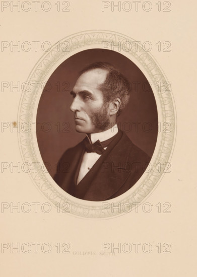 Goldwin Smith, page, photomechanical print, photographer: Lock & Whitfield, cliché maker: anonymous, c. 1873 - in or before 1878, paper, Woodburytype, Woodbury Process, height 115 mm x width 89 mm, Person, journalist, reporter, historical persons (portraits and scenes from the life) ((full) bust portrait), An oval sepia-toned portrait of a clean-shaven man in formal attire shown in profile, framed by a decorative oval border on a light beige background.