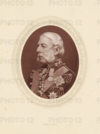 Lord Airey, page, photomechanical print, photographer: Lock & Whitfield, cliché maker: anonymous, c. 1873 - in or before 1878, paper, Woodburytype, Woodbury Process, height 115 mm x width 89 mm, Person, Richard Airey (1st Baron Airey), officer, historical persons (portraits and scenes from the life) ((full) bust portrait), A sepia-toned oval portrait of an older man in formal military attire is centered on a pale sheet with a decorative oval border; he is shown in profile facing left with white hair and prominent sideburns, wearing a richly embroidered uniform adorned with braided cords, medals, star-shaped insignia, and ornate collars, all captured against a dark background within the oval.
