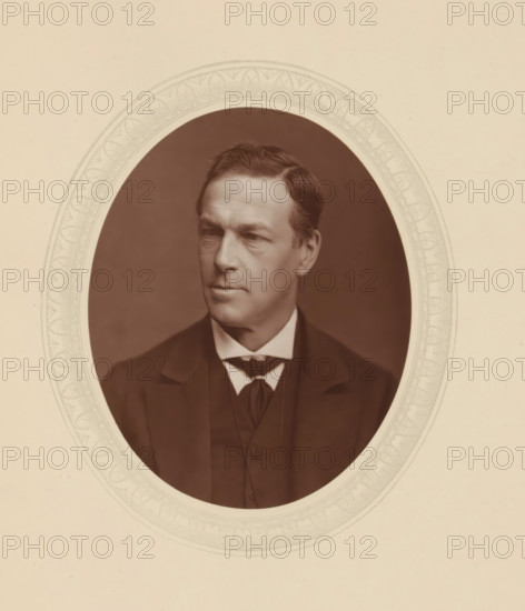 Sir Charles E. Pollock, page, photomechanical print, photographer: Lock & Whitfield, cliché maker: anonymous, c. 1876 - in or before 1881, paper, Woodburytype, Woodbury Process, height 115 mm x width 89 mm, Person, Charles Edward Pollock, magistracy, judges, historical persons (portraits and scenes from the life) ((full) bust portrait), A sepia oval portrait of a man set against a decorative oval border on a light background, showing a middle-aged man with neatly combed dark hair and a clean-shaven face, wearing a dark suit jacket, a vest, a white shirt with a high collar, and a dark bow-like necktie, his face turned slightly to the side with a neutral expression and the portrait framed within an ornate patterned mat.