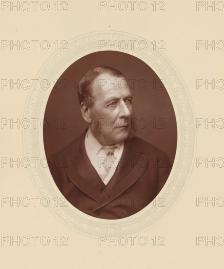 Serjeant Ballantine, page, photomechanical print, photographer: Lock & Whitfield, cliché maker: anonymous, c. 1877 - in or before 1882, paper, Woodburytype, Woodbury Process, height 115 mm x width 89 mm, Person, William Ballantine, lawyer, attorney at law, historical persons (portraits and scenes from the life) ((full) bust portrait), A sepia-toned oval portrait of an older man shown from the chest up, set against a pale background with a faint decorative oval border; he faces slightly to his right with a calm expression, short combed hair, prominent sideburns, and visible facial lines, wearing a dark jacket over a light shirt and a loosely tied cravat.