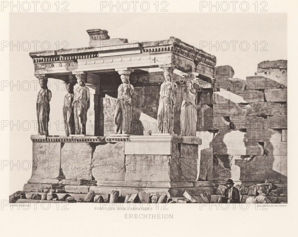 Érechthéion, Facade with caryatids of the Erechtheion on the Acropolis of Athens, page, photomechanical print, Athens, cliché maker: Dujardin, printer (person): Chardon-Wittmann, c. 1880 - in or before 1890, photographer, printer (person), Athene, Periféreia Protevoúsis, paper, photoaquatint, height 145 mm x width 215 mm, ruin of a building, architecture, caryatids, temple, shrine, Greek religion, Akropolis, Erechtheion, A sepia-toned photograph of an ancient stone structure showing a section of a building with a decorated horizontal entablature supported by sculpted female figures serving as columns; the figures wear draped garments and stand on a raised platform, each topped with a carved capital, and they are set against large weathered stone blocks forming the wall and base of the structure, with scattered stone fragments and rubble at the foreground; a man wearing a hat and coat sits among the stones near the lower right corner of the image.