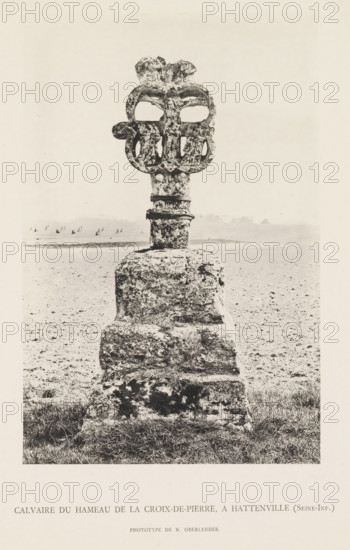Calvaire du Hameau de la Croix-de-Pierre, A. Hattenville (Seine-Inf.), Stone calvary, page, photomechanical print, number: 'Pl. V.', photographer: N. Oberlender, cliché maker: Raoul Bonet (possibly), c. 1885 - in or before 1895, paper, collotype, phototype, height 206 mm x width 138 mm, sculpture, crucified Christ with other persons, A weathered stone monument stands on a grassy patch leading into a flat, open terrain, consisting of a rough rectangular base topped by a narrower shaft and an ornate carved head with symmetrical rounded openings; the stone surfaces display pitting and irregular texture, and the background shows a distant low horizon with faint shapes and a pale sky.