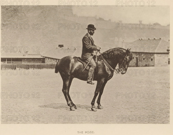 The poise, Man on a horse, page, photomechanical print, photographer: Alexander Nicol (possibly), Edinburgh (possibly), cliché maker: Römmler & Jonas, Dresden, c. 1879 - in or before 1889, paper, collotype, photoprint, height 97 mm x width 137 mm, horse, riding a horse, ass, or mule, rider, horseman, head-gear: bowler hat, A sepia-toned photograph of a man seated upright on a dark horse standing in an open sandy area with low buildings in the background; the man wears a bowler hat, a suit jacket, trousers, and boots, and he holds the reins and a riding crop while looking forward; the horse has a glossy coat, a bridle, and its head slightly lowered, with visible muscular neck and legs; the background shows low rooftops and a fence line under a pale sky.