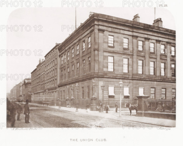 Façade of the Union Club in Manchester, The Union Club, page, photomechanical print, number: 'Pl. 18.', photographer: Brothers, Alfred, Manchester, cliché maker: anonymous, c. 1868 - in or before 1878, printer (person), paper, collotype, photoprint, height 132 mm x width 185 mm, Print after page 24., facade (of house or building), A sepia-toned street scene showing a large stone corner building with multiple windows and decorative columns, iron railings along the sidewalk, several tall gas street lamps, a horse hitched near the entrance, a few men standing on the pavement in period clothing, awnings over some ground-floor windows, and a cobblestone road leading past a row of similar buildings.