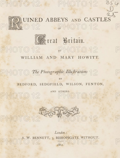 Ruined abbeys and castles of Great Britain, book, name: 'ex libris SFJ', writer (clerical worker): William Howitt, writer (clerical worker): Mary Howitt, publisher: Alfred William Bennett, London, 1862, writer (clerical worker), biological material, paper, leather, albumen print, color on cut, height 227 mm x width 175 mm x thickness 30 mm, An aged page with decorative initials and ornate serif text arranged in centered lines, showing a margin with small brown foxing spots and larger mottled stains across the paper, a pencil scribble in the top right corner, an ornamental floral engraving near the middle, and evenly spaced lines of printed words and names in various typefaces.