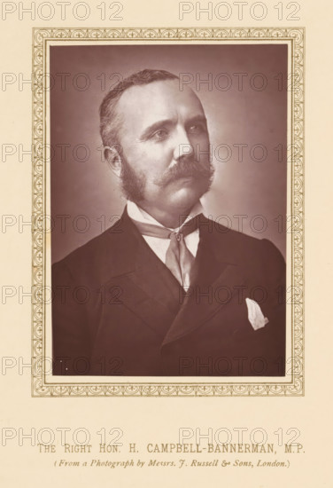 The right hon. H. Campbell-Bannerman, MP, page, photomechanical print, photographer: Russell & Sons, London, c. 1875 - c. 1880, printmaker, paper, Woodburytype, height 118 mm x width 83 mm, Person, Henry Campbell-Bannerman, politician, eg party leader, A sepia-toned portrait of a man shown from the chest up, framed by a decorative rectangular border with repeating ornamental motifs; the man has short hair and prominent sideburns connected to a thick mustache, a high-collared shirt with a cravat tied at the neck, a dark suit jacket with a visible lapel, and a light-colored pocket square; the background inside the frame is plain and slightly shaded, while the surrounding area outside the frame is a light cream color.