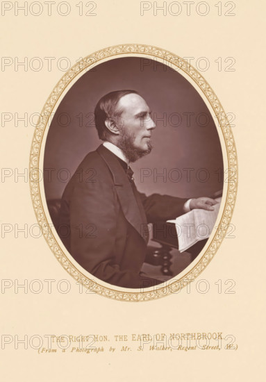 Portrait of Thomas Baring, The right hon. the Earl of Northbrook, page, photomechanical print, photographer: Samuel Alexander Walker, London, c. 1877 - c. 1882, printmaker, paper, Woodburytype, height 110 mm x width 86 mm, Person, Thomas George Baring (1st Earl of Northbrook), politician, eg party leader, An oval sepia-toned portrait shows a bearded man in profile facing right, wearing a dark suit jacket and a white collar, seated with one arm resting on a surface and a hand holding a folded sheet; the portrait is set within a decorative oval border on a pale background.