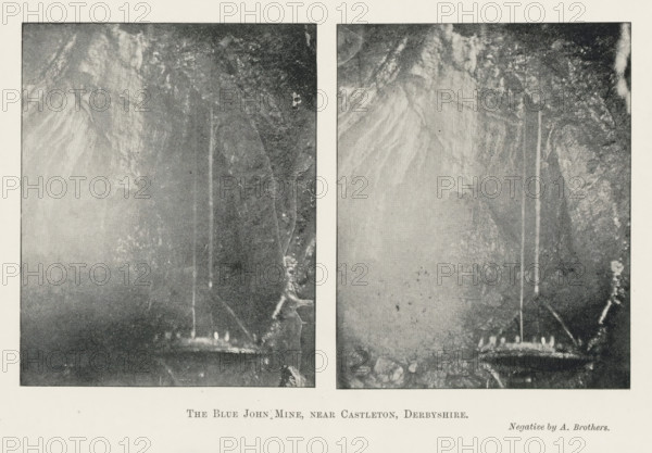 The Blue John Mine, near Castleton, Derbyshire, page, photomechanical print, photographer: Brothers, Alfred, Blue John Cavern, c. 1889 - in or before 1899, printmaker, paper, autotypie, height 151 mm x width 223 mm, cave, grotto, Two vertical rectangular black and white photographic panels sit side by side with a narrow white gap between them, each panel depicting a dark cave interior with rough textured rock walls and a vertical shaft of lighter tone running from near the top toward a lower platform area; the left panel shows a faintly illuminated rounded ledge at the bottom with small bright shapes suggesting lights, while the surrounding rock surfaces display mottled patterns and streaks, and the right panel mirrors similar cave features with a clearer view of rocky textures and the same vertical lighter column ending above a rocky ledge, all set against a wide pale border.