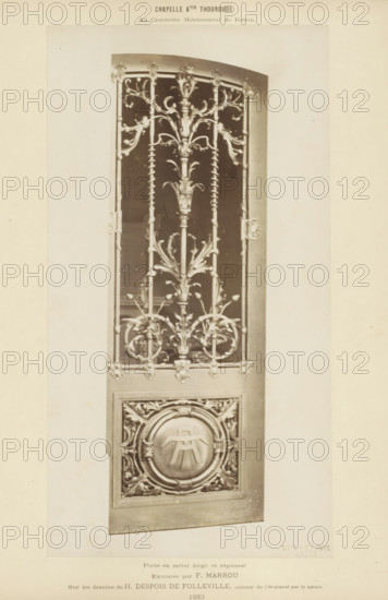 Metal door for a chapel on the Cimetière Monumental in Rouen, Chapelle Atin Thouroude au Cimetière Monumental de Rouen. Porte en metal forgé et repoussé, photograph, page, name: 'Witz & cie Phot. Rouen', inscription: 'Exécutée by F. Marrou Sur les dessins de H. Despois de Folleville, author de l'ornement par la nature', photographer: Witz et Cie., c. 1883 - in or before 1884, Witz et Cie., photographer, paper, albumen print, height 265 mm x width 142 mm, gate, entrance, A tall ornate metal door panel with decorative wrought elements including vertical bars, spiral-twisted rods, and stylized floral and foliate motifs forming symmetrical patterns, a central vertical stem with branching leaves and scrolls, circular ornamental frames near the lower section enclosing a raised emblem-like form, and a rectangular surround with carved corner details, all shown against a plain light background.